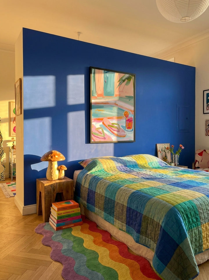 Oversized statement modern wall art print styled on the wall in a colourful eclectic bedroom