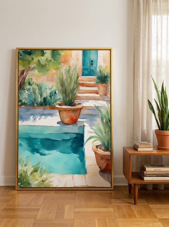 Oversized statement canvas wall art with a gold leaf surround leaning against the wall in a mid-century living room