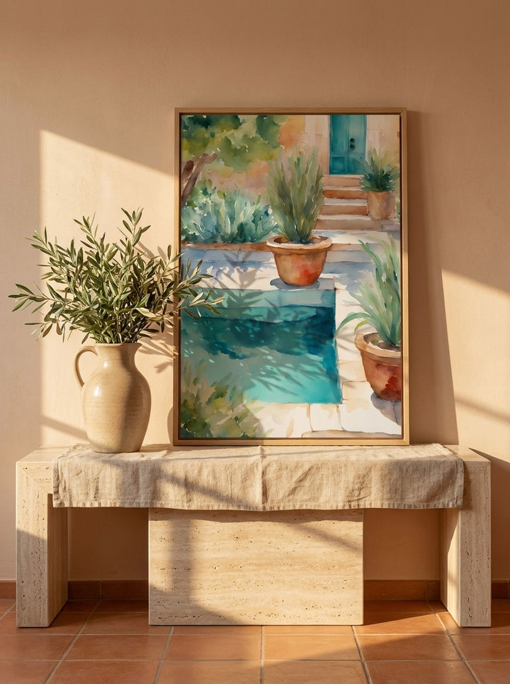 Canvas wall art with a natural timber surround standing on a console in a Mediterranean bathroom