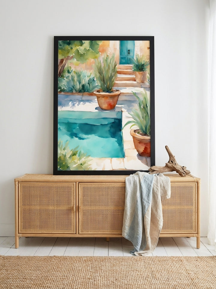 Modern wall art print standing on a sideboard in a coastal bedroom