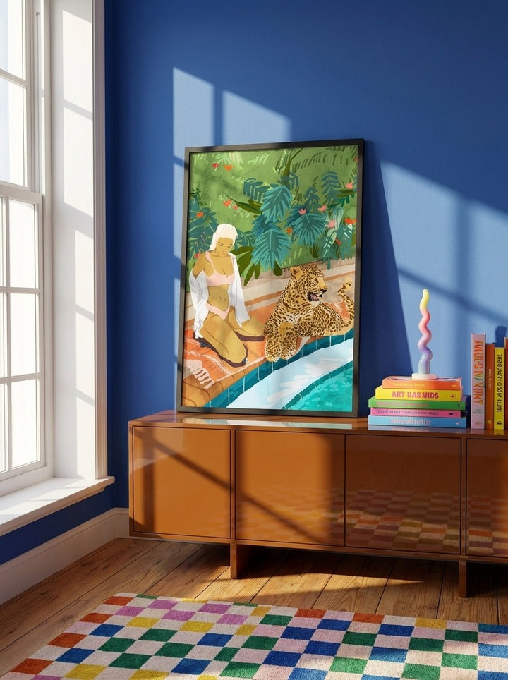 Modern wall art print standing on a sideboard in a colourful eclectic bedroom