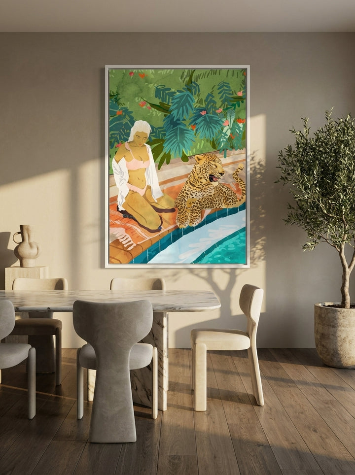 Oversized statement canvas wall art with a white surround styled on the wall in a luxe dining room