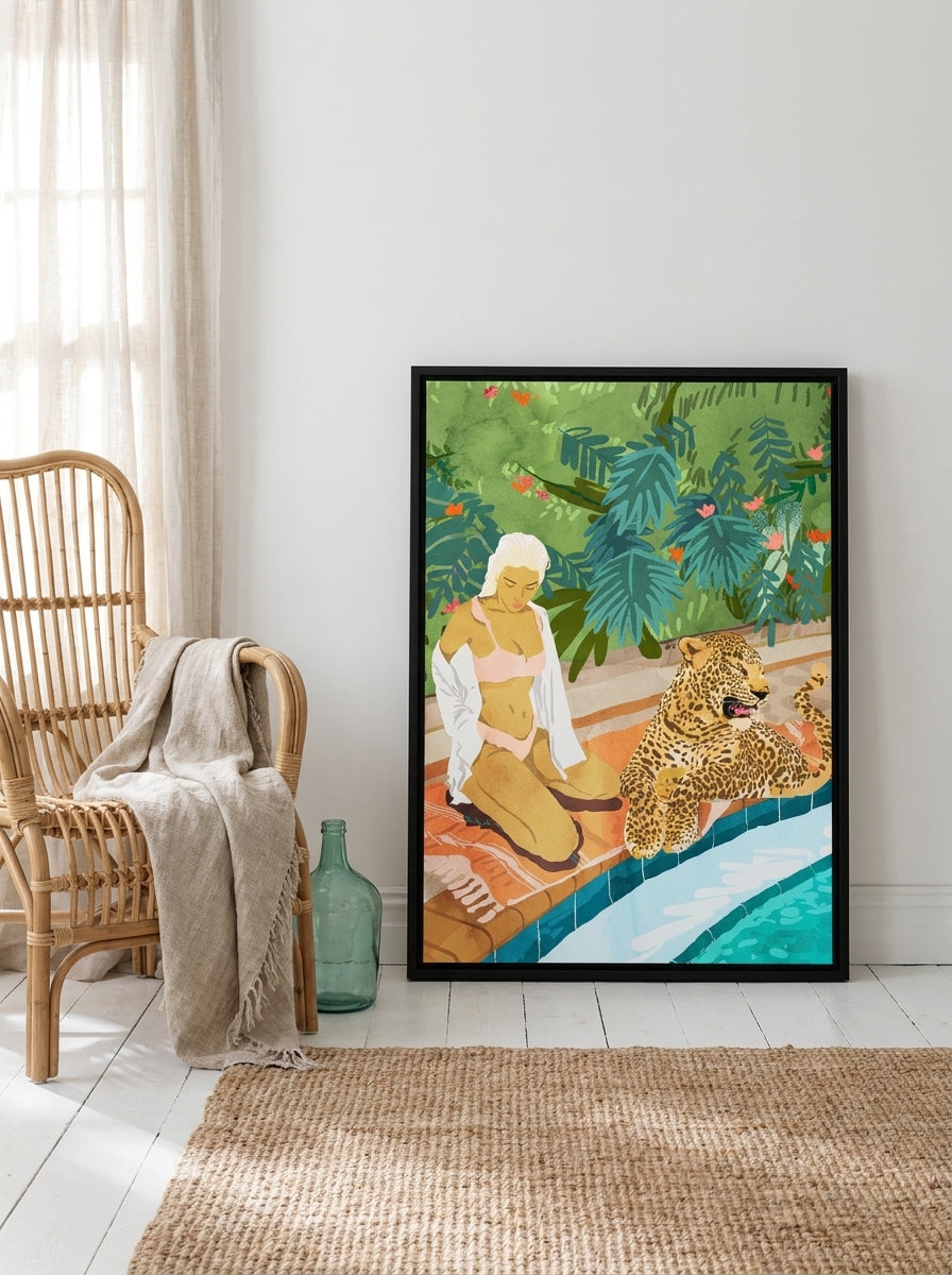 Canvas wall art with a black surround leaning against the wall in a coastal bedroom