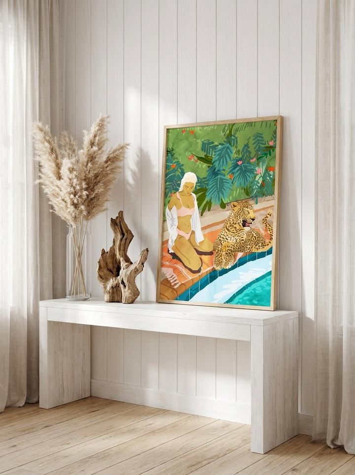 Modern wall art print standing on a console in a coastal dining room