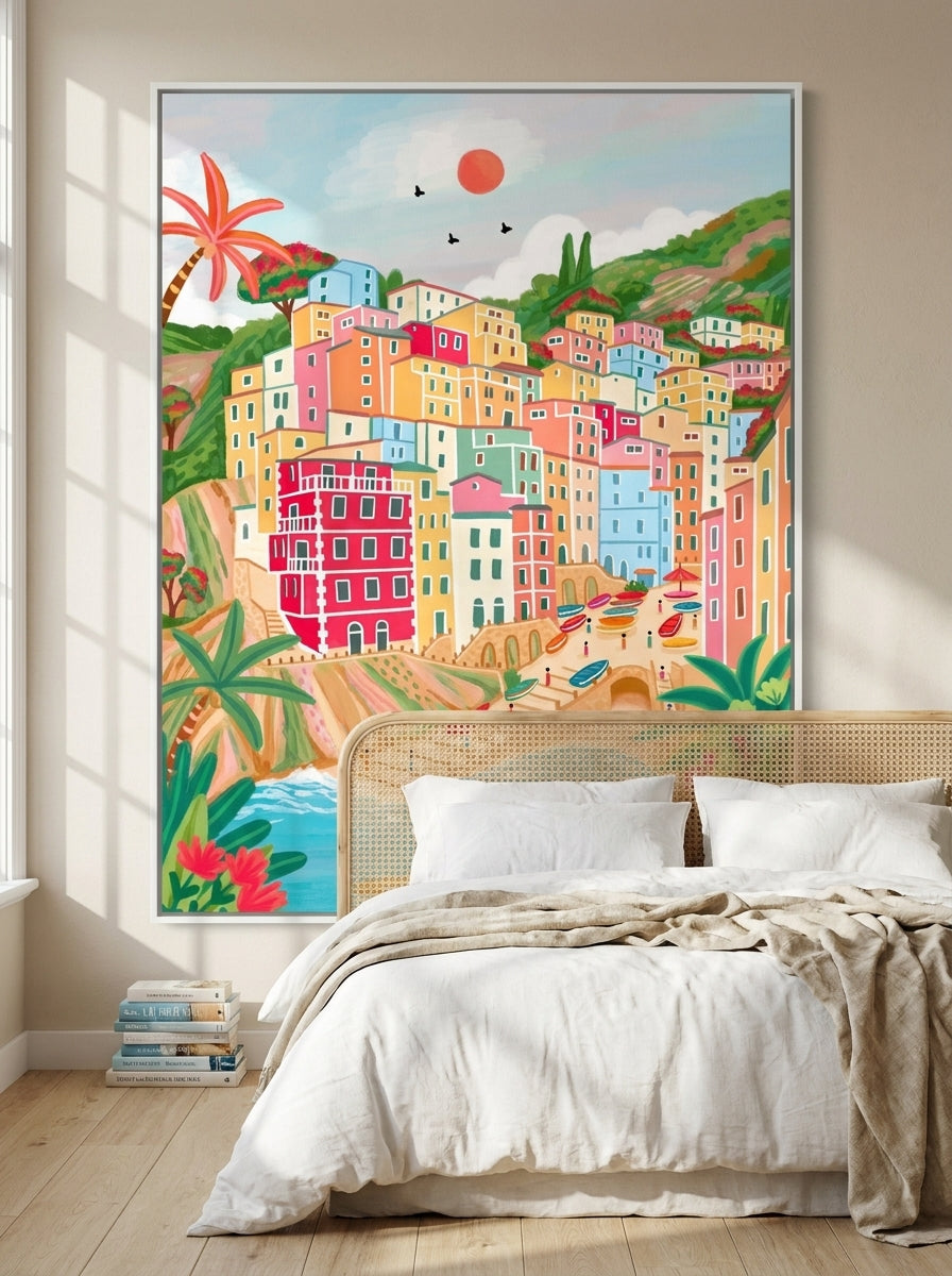 Oversized statement canvas wall art with a white surround styled on the wall in a coastal bedroom