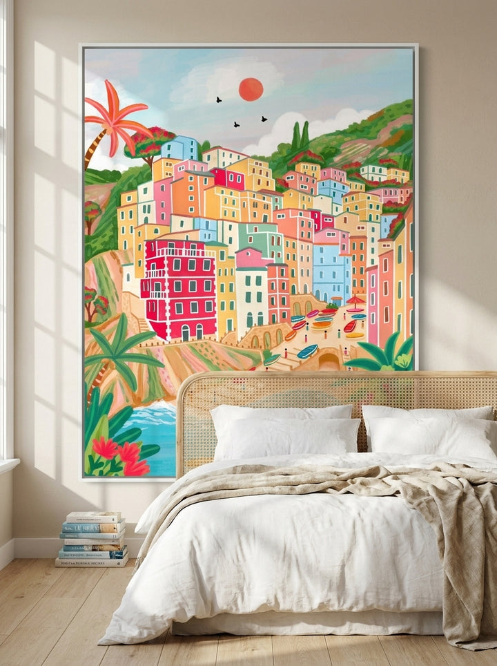 Oversized statement canvas wall art with a white surround styled on the wall in a coastal bedroom