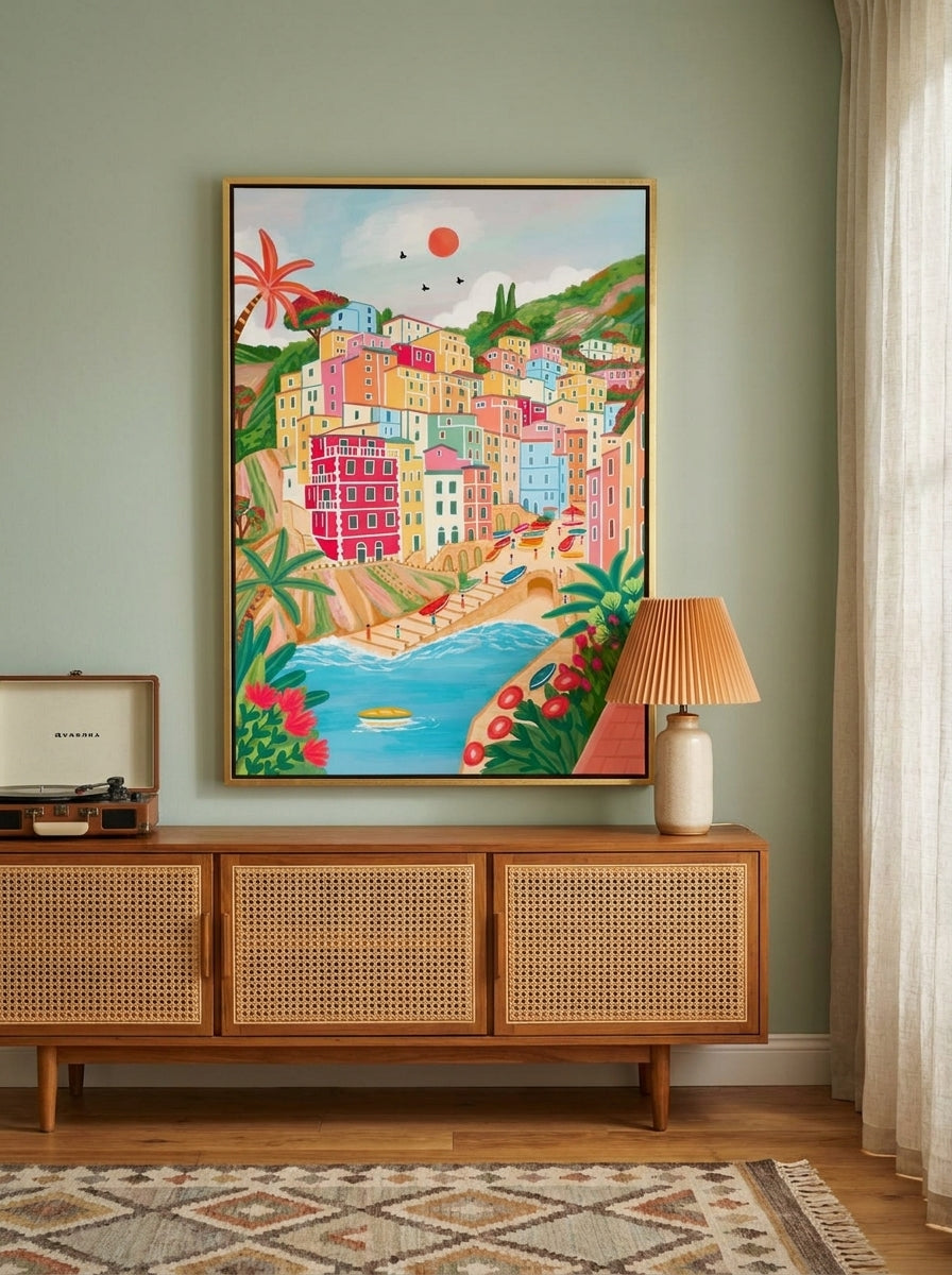 Canvas wall art with a gold leaf surround styled on the wall in a mid-century living room