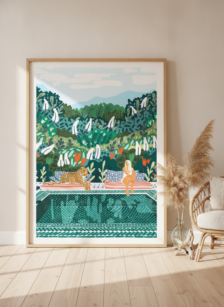 Oversized statement canvas wall art with a natural timber surround leaning against the wall in a coastal dining room