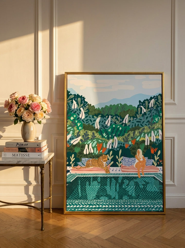 Canvas wall art with a gold leaf surround leaning against the wall in a Parisian living room