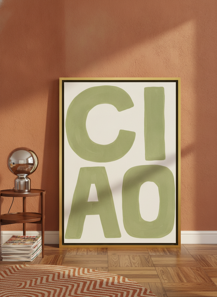 Canvas wall art with a gold leaf surround leaning against the wall in a retro 70s bedroom