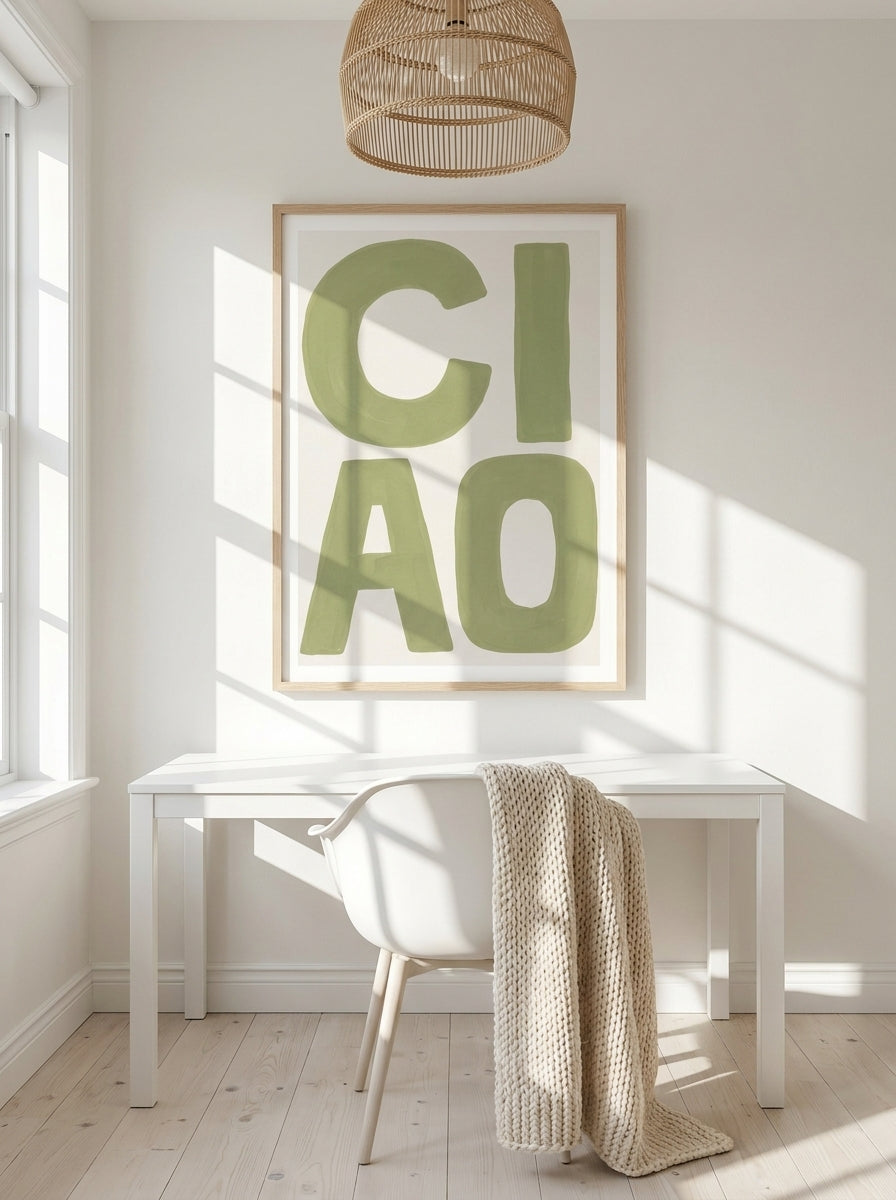 Modern wall art print styled on the wall in a bright Scandinavian home office