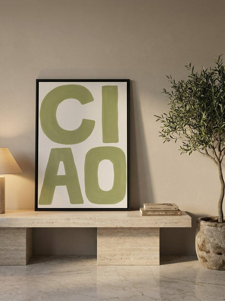 Canvas wall art with a black surround standing on a console in a luxe home office