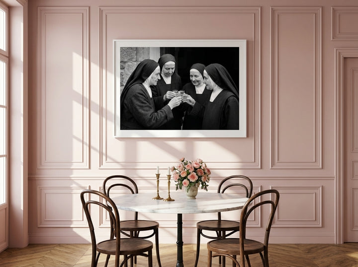 Oversized statement modern wall art print styled on the wall in a Parisian dining room