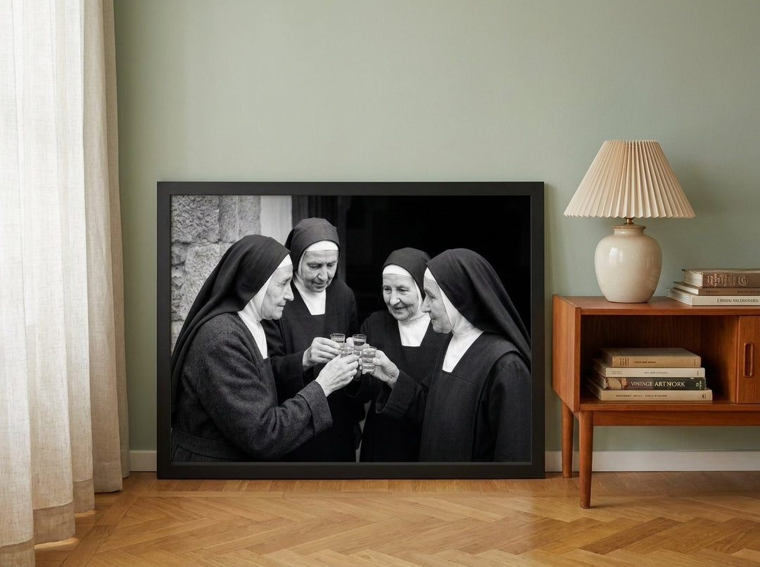 Modern wall art print leaning against the wall in a mid-century bedroom