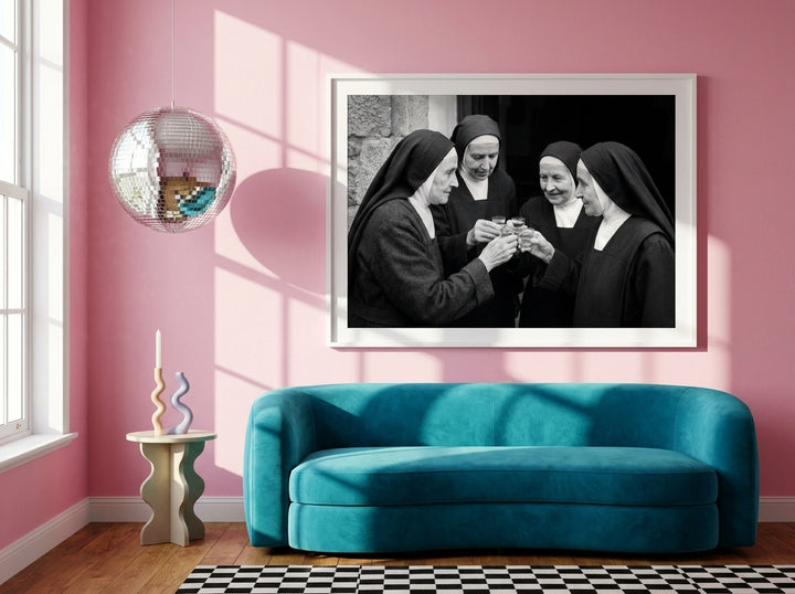 Oversized statement modern wall art print styled on the wall in a colourful eclectic living room