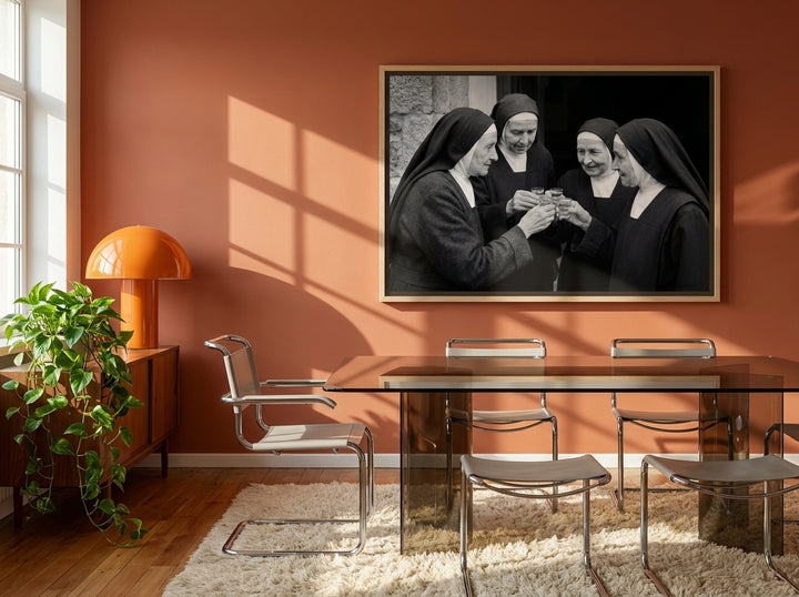 Oversized statement canvas wall art with a natural timber surround styled on the wall in a retro 70s dining room