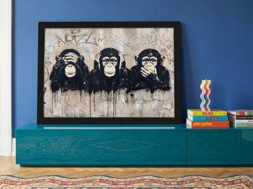 Modern wall art print standing on a sideboard in a colourful eclectic home office