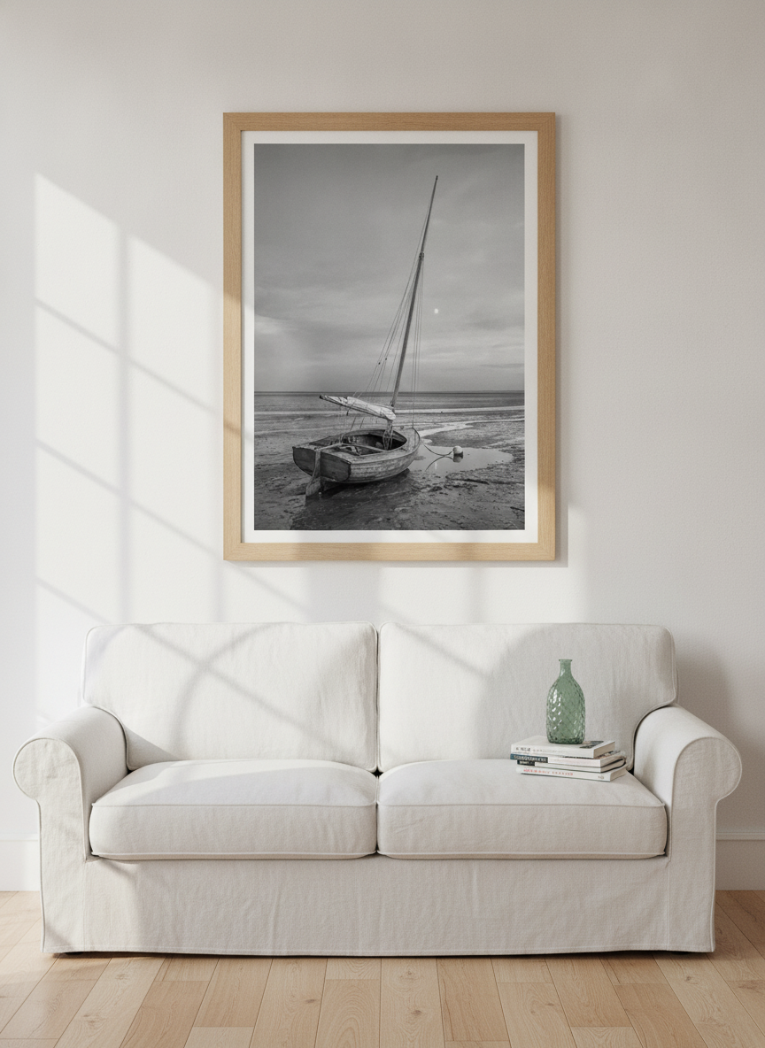 Modern wall art print styled on the wall in a coastal living room