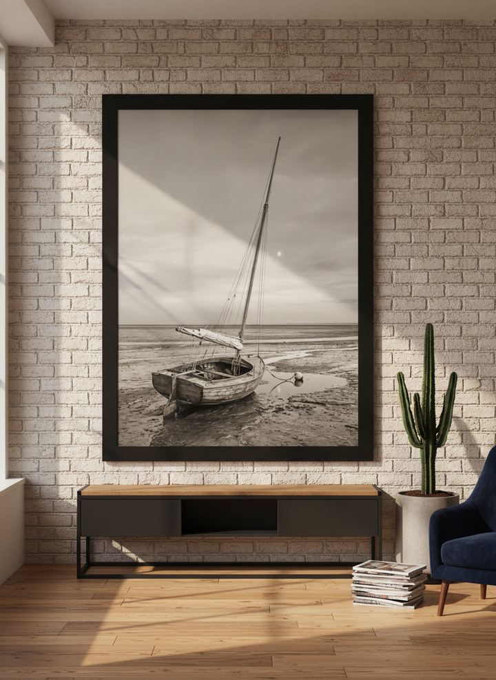 Oversized statement modern wall art print styled on the wall in an industrial loft living room