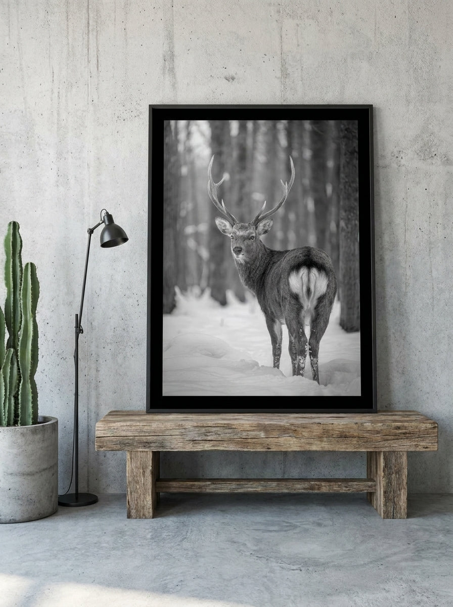 Modern wall art print standing on a bench in an industrial loft home office