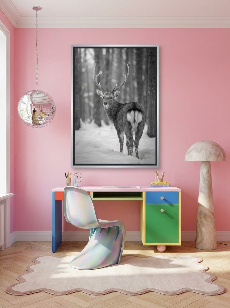 Canvas wall art with a silver leaf surround styled on the wall in a colourful eclectic home office