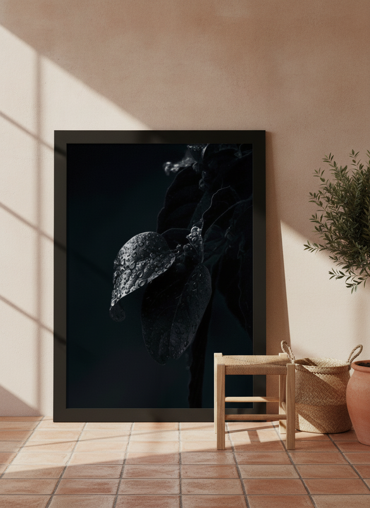 Modern wall art print leaning against the wall in a Mediterranean bathroom