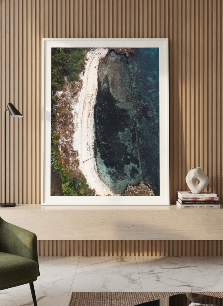 Modern wall art print standing on a console in a luxe living room