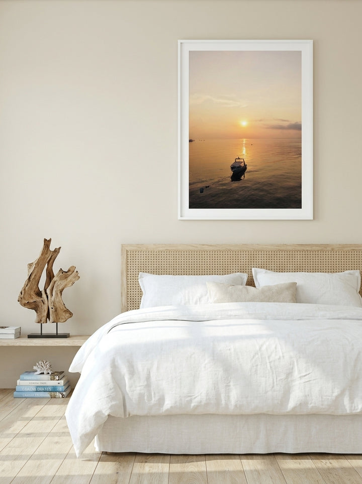 Modern wall art print styled on the wall in a coastal bedroom