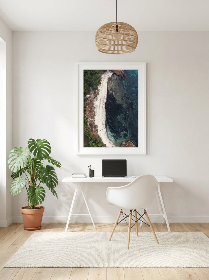 Modern wall art print styled on the wall in a bright Scandinavian home office