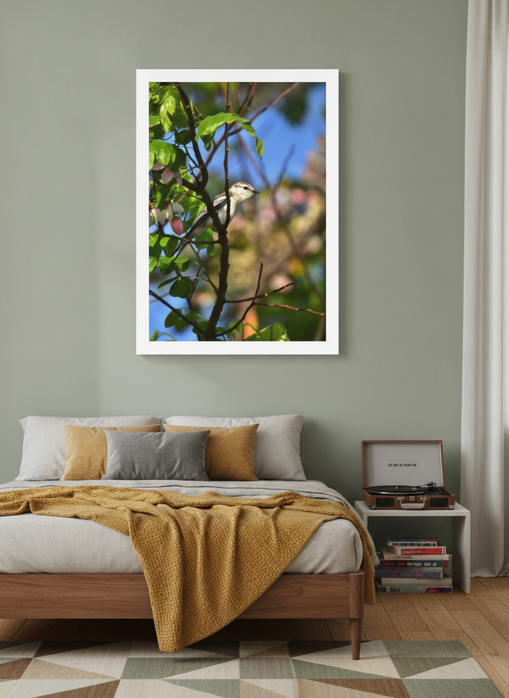 Modern wall art print styled on the wall in a mid-century bedroom
