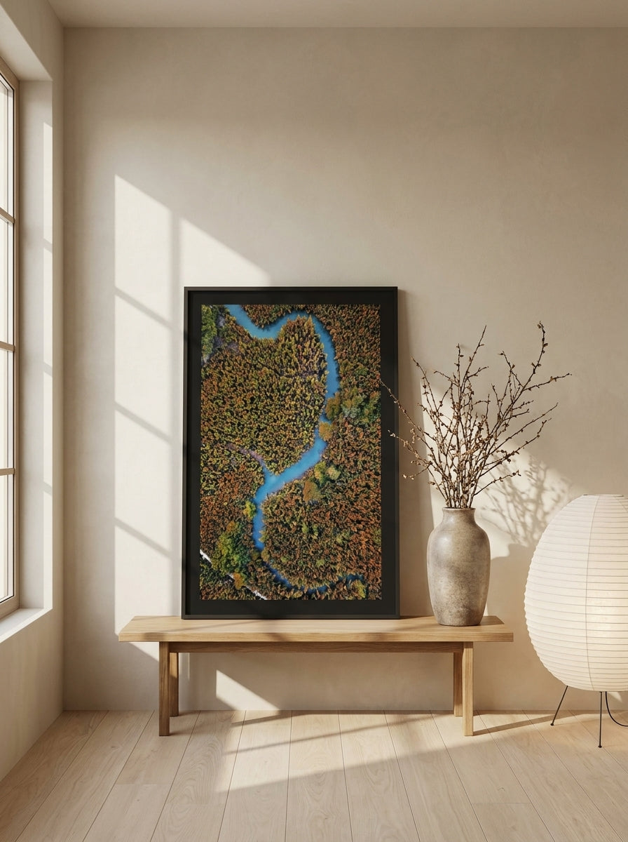Modern wall art print standing on a bench in a warm Japandi home office