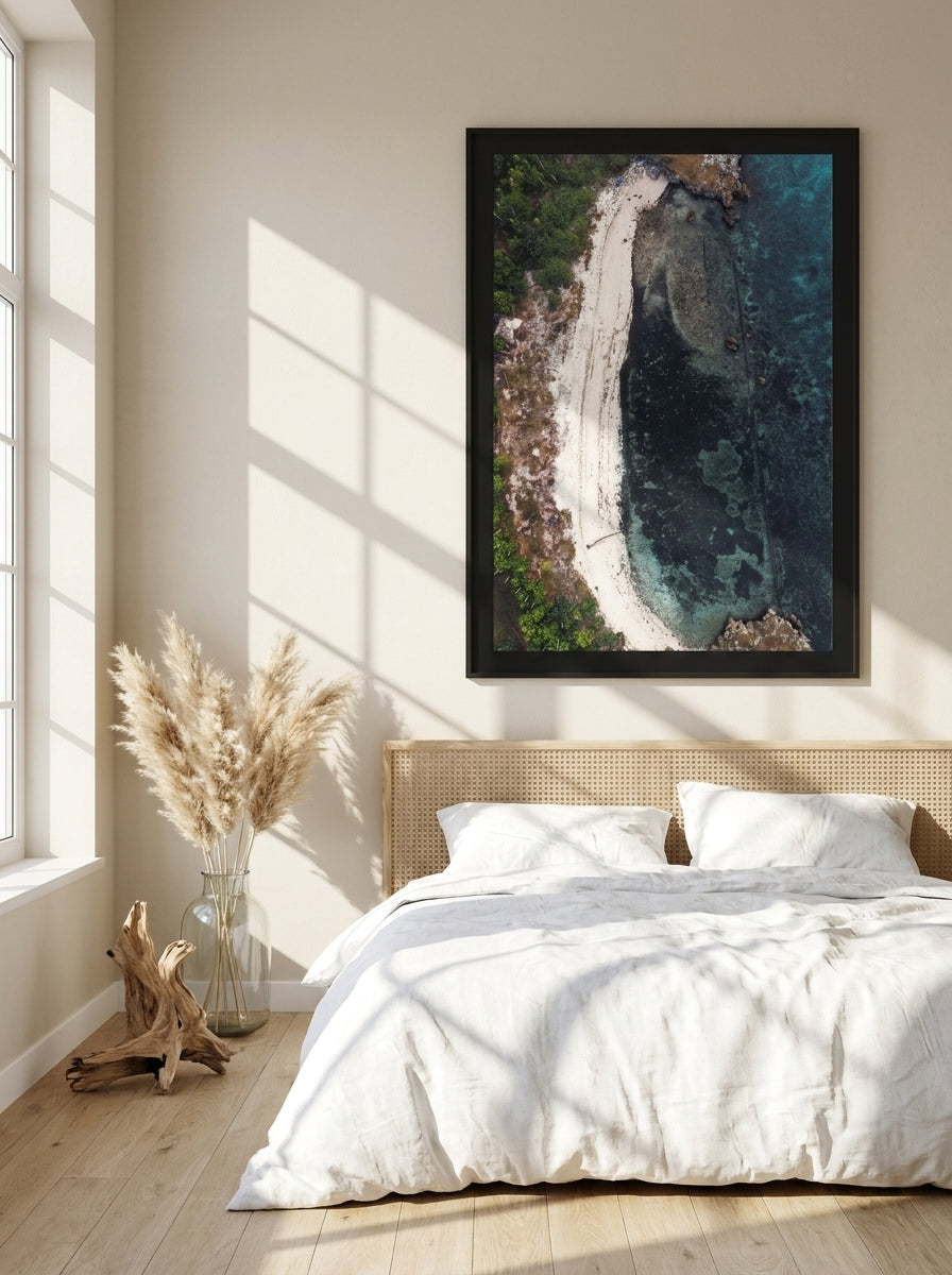 Oversized statement modern wall art print styled on the wall in a coastal bedroom