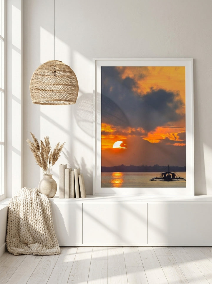 Modern wall art print standing on a sideboard in a bright Scandinavian living room