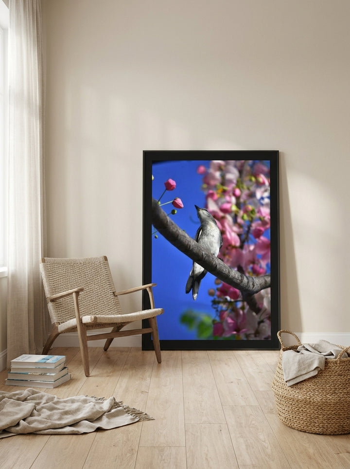 Oversized statement modern wall art print leaning against the wall in a coastal bedroom