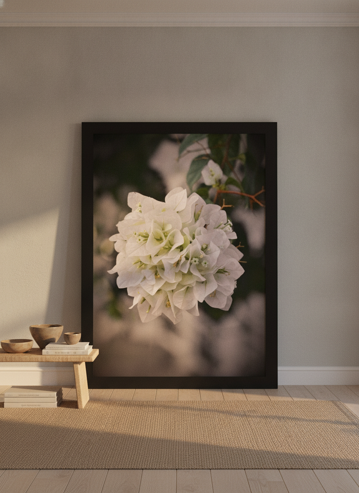 Oversized statement modern wall art print leaning against the wall in a warm Japandi living room