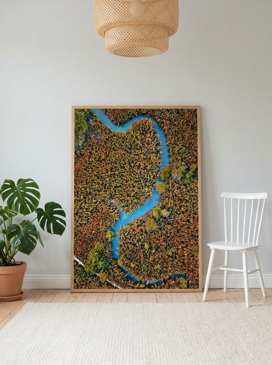 Oversized statement modern wall art print leaning against the wall in a bright Scandinavian dining room
