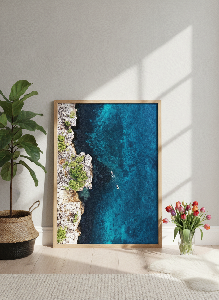 Modern wall art print leaning against the wall in a bright Scandinavian bathroom