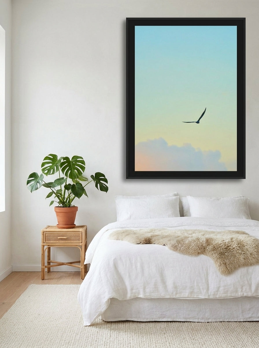 Oversized statement modern wall art print styled on the wall in a bright Scandinavian bedroom