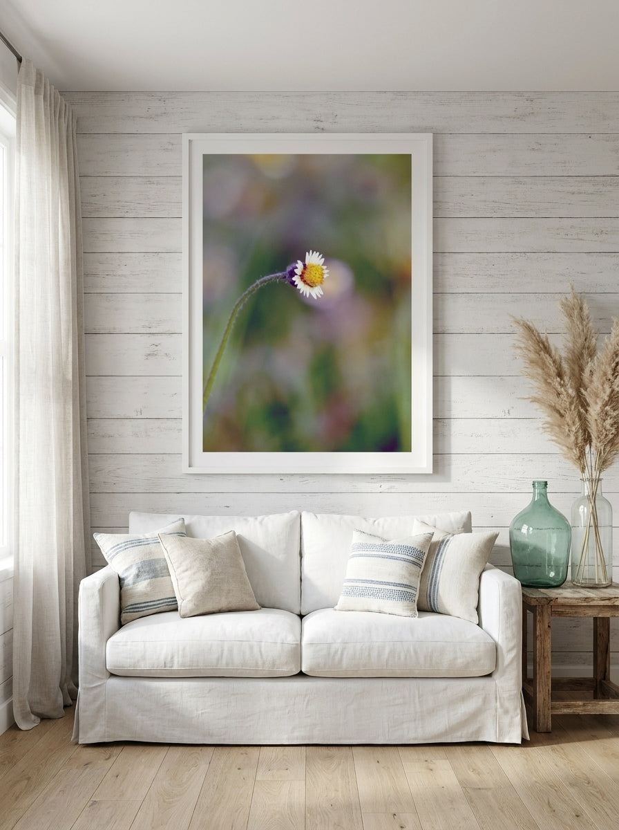 Oversized statement modern wall art print styled on the wall in a coastal living room