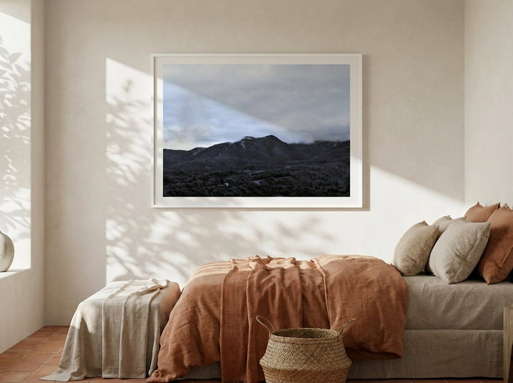 Modern wall art print styled on the wall in a Mediterranean bedroom