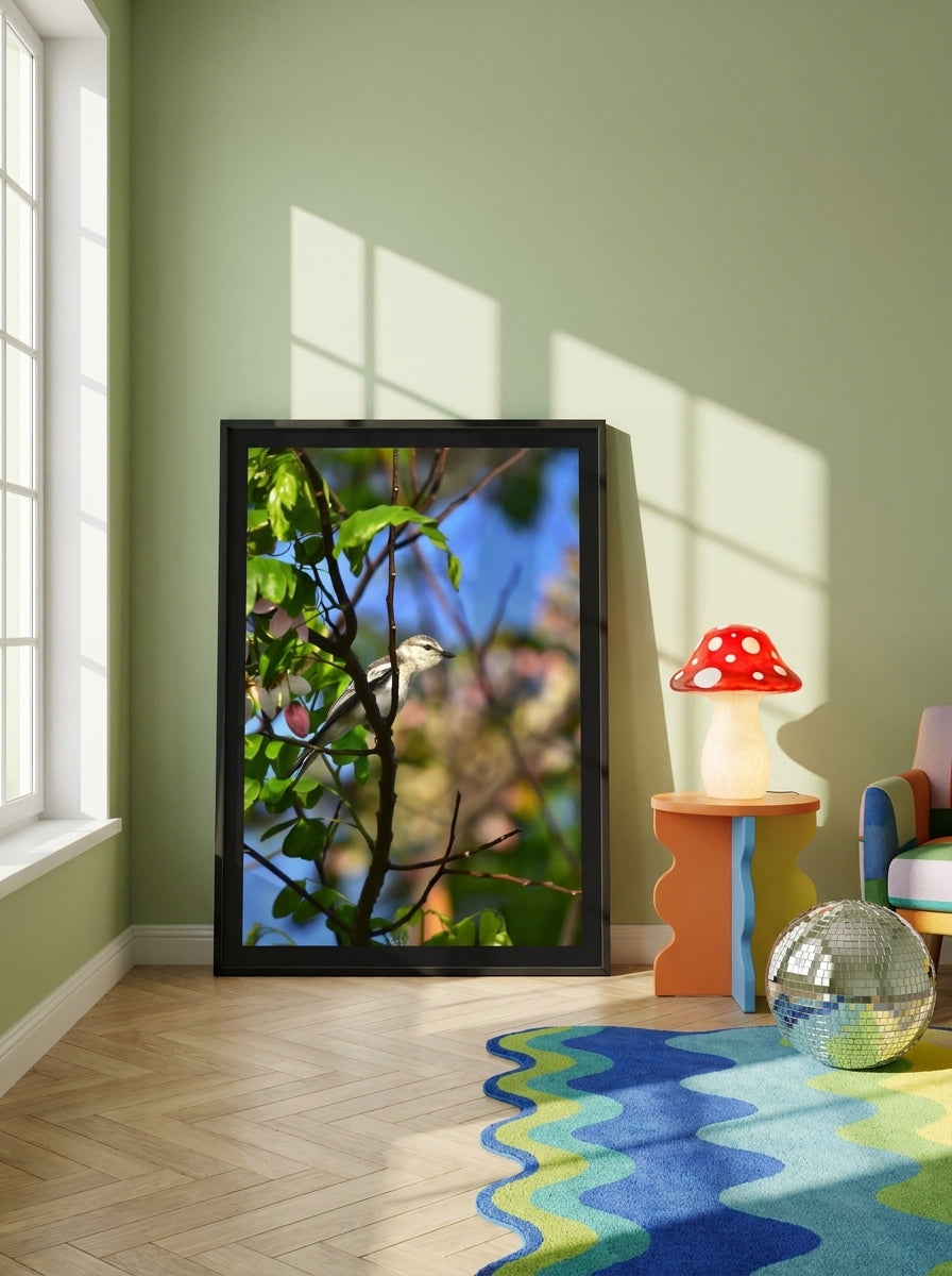 Oversized statement modern wall art print leaning against the wall in a colourful eclectic living room