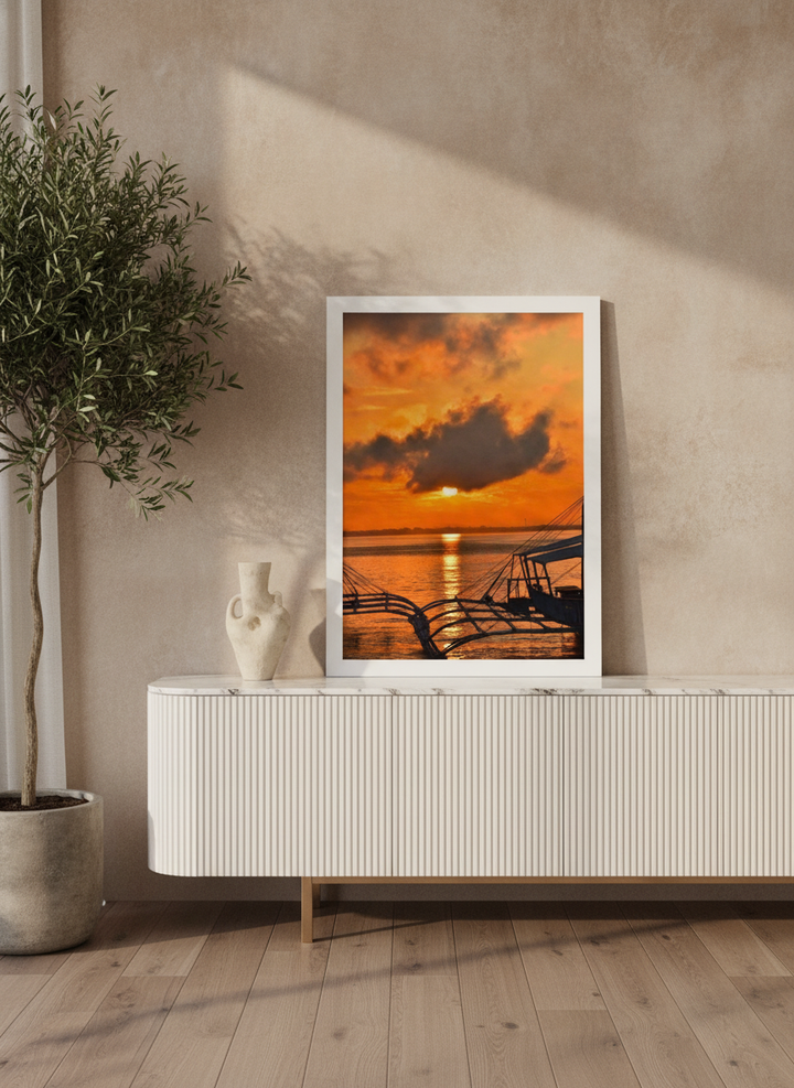 Modern wall art print standing on a sideboard in a luxe bedroom