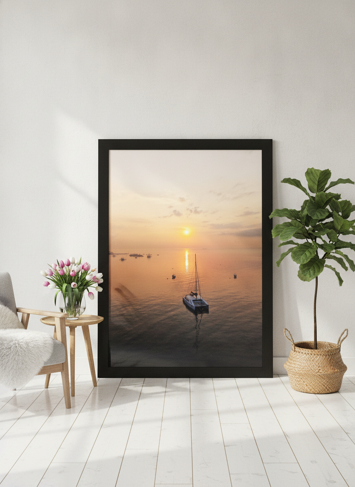 Oversized statement modern wall art print leaning against the wall in a bright Scandinavian living room