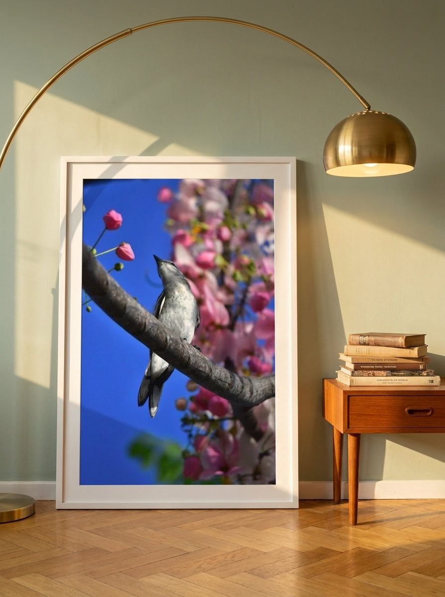Oversized statement modern wall art print leaning against the wall in a mid-century living room