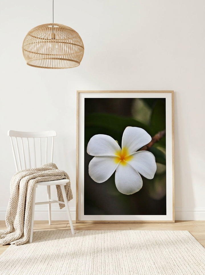 Modern wall art print leaning against the wall in a bright Scandinavian dining room