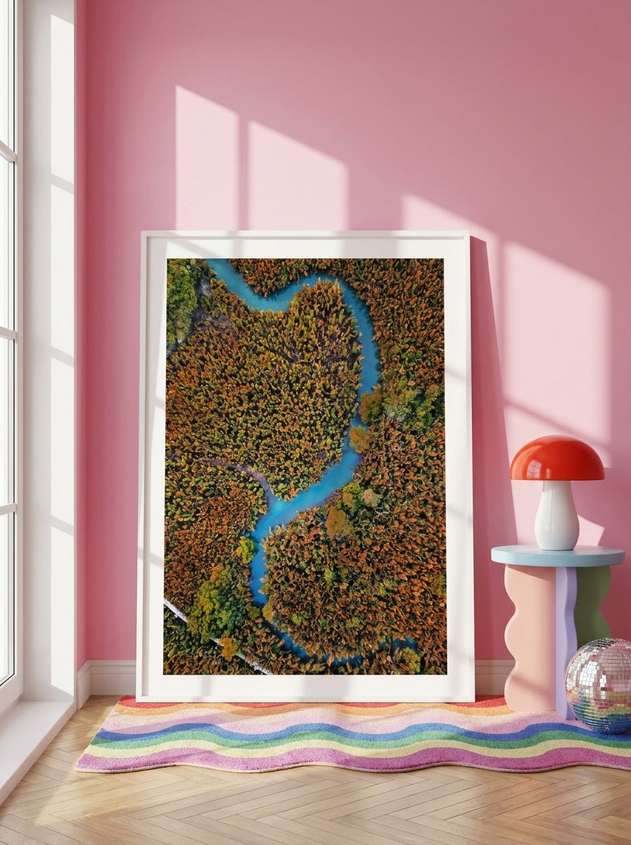 Oversized statement modern wall art print leaning against the wall in a colourful eclectic living room