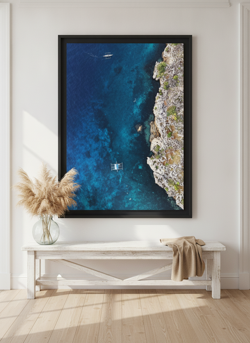 Oversized statement modern wall art print styled on the wall in a coastal living room