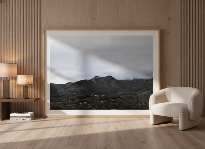Oversized statement modern wall art print leaning against the wall in a luxe bedroom