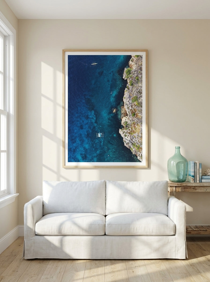 Modern wall art print styled on the wall in a coastal living room