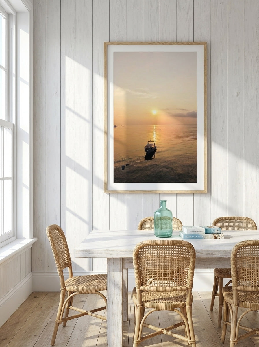 Modern wall art print styled on the wall in a coastal dining room